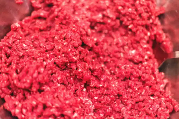 ground beef is brown on outside pink inside