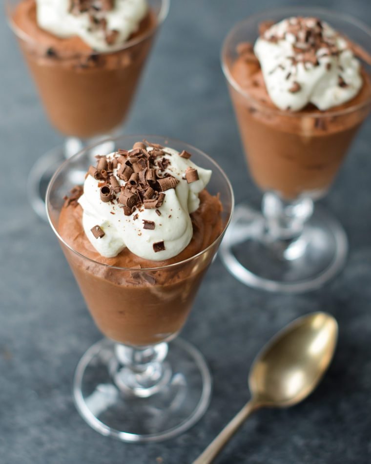 Chocolate mousse in stemmed glasses.