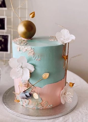 Pink and blue gender reveal cake.