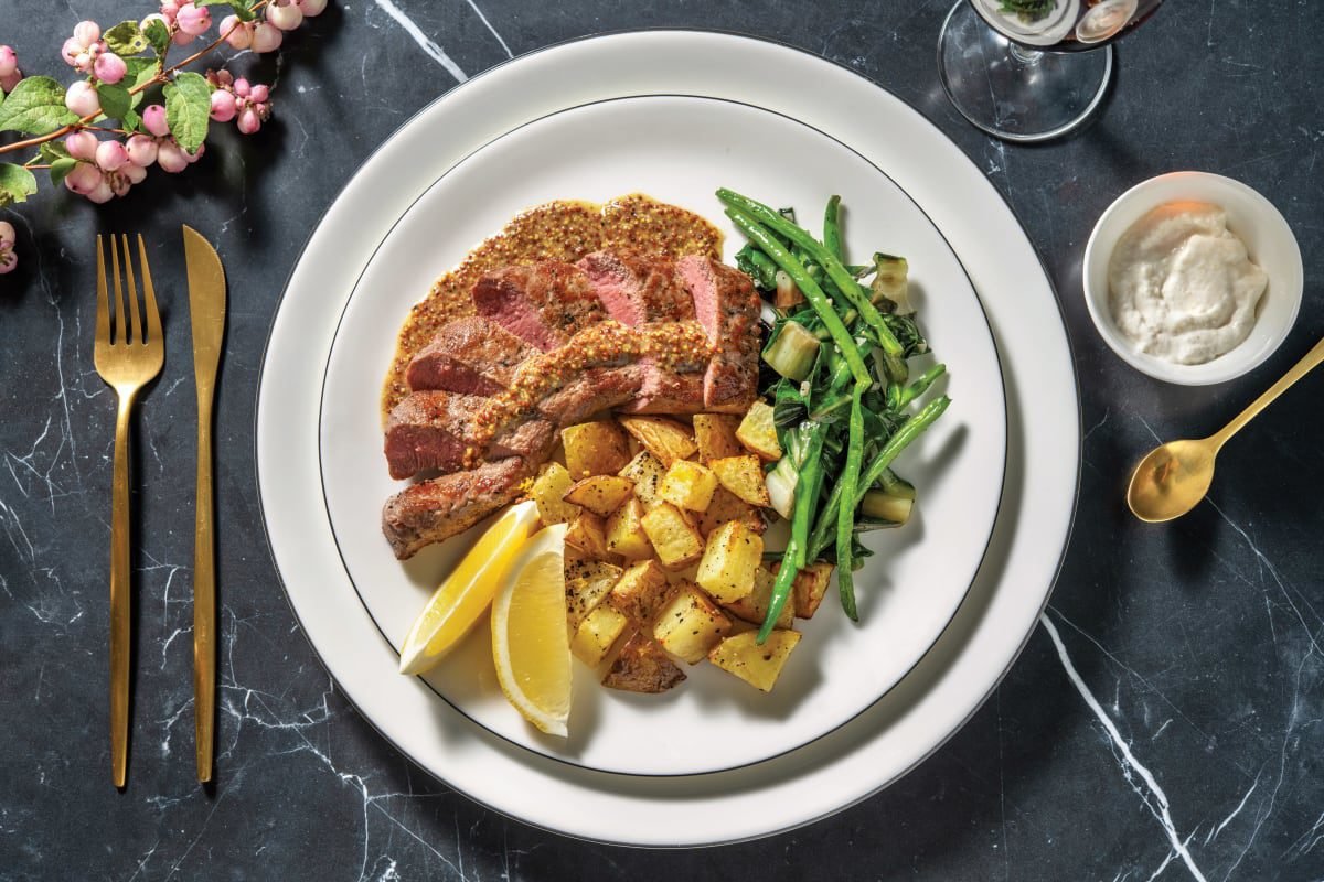 Honey Mustard Glazed Lamb Backstrap with Garlicky Greens, Lemon Pepper  Potatoes & Horseradish Sauce