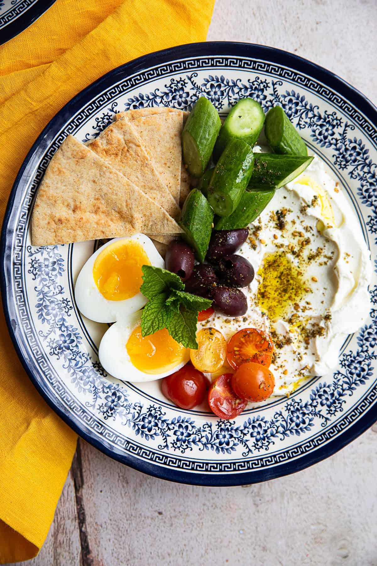 Overhead shot of Mediterranean breakfast bowl. 