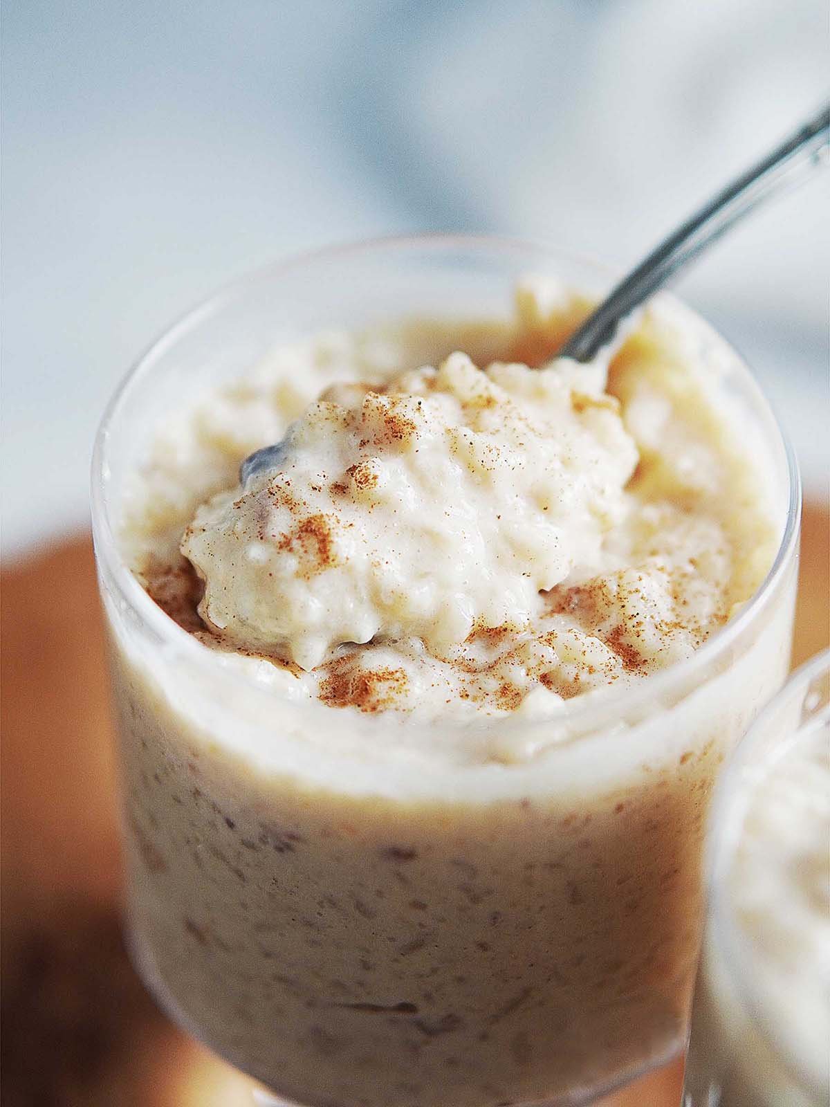 Arroz con leche in a small cup.