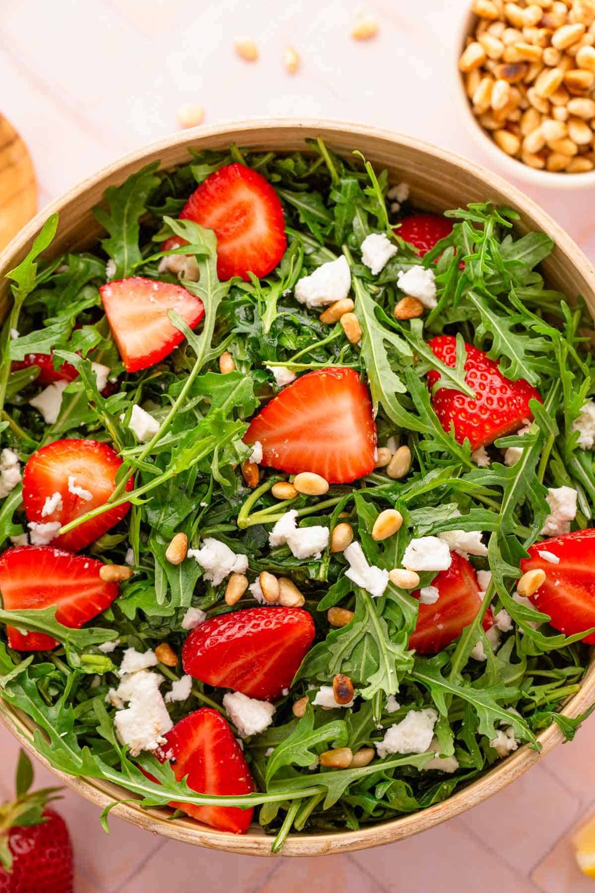 strawberry arugula salad with feta cheese.