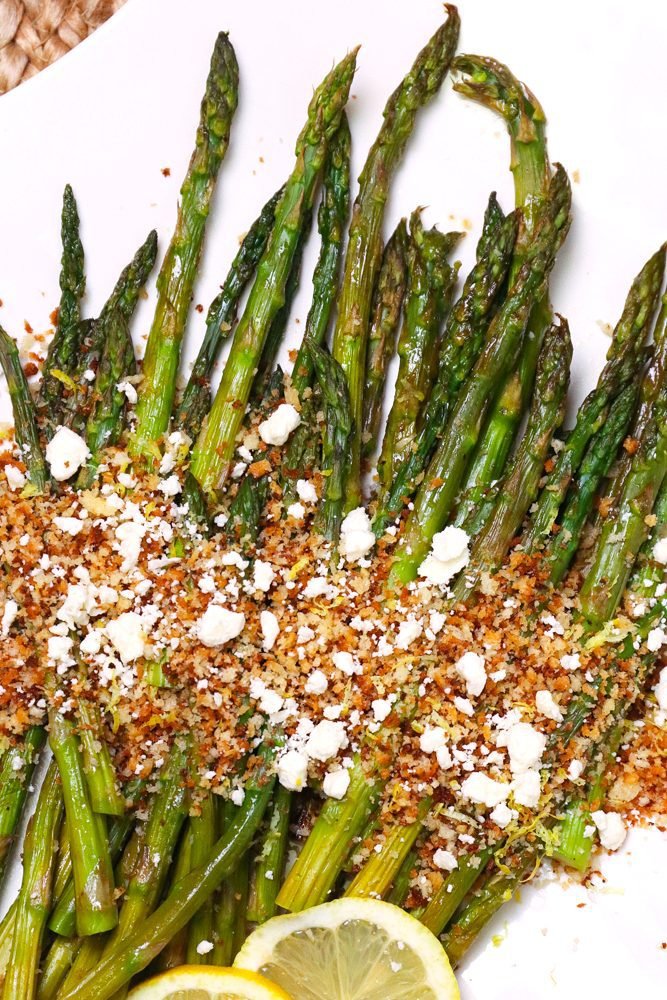 Roasted Asparagus topped with toasted Panko Breakcrumbs, Lemon and Feta cheese is a flavorful side dish that easy to make!