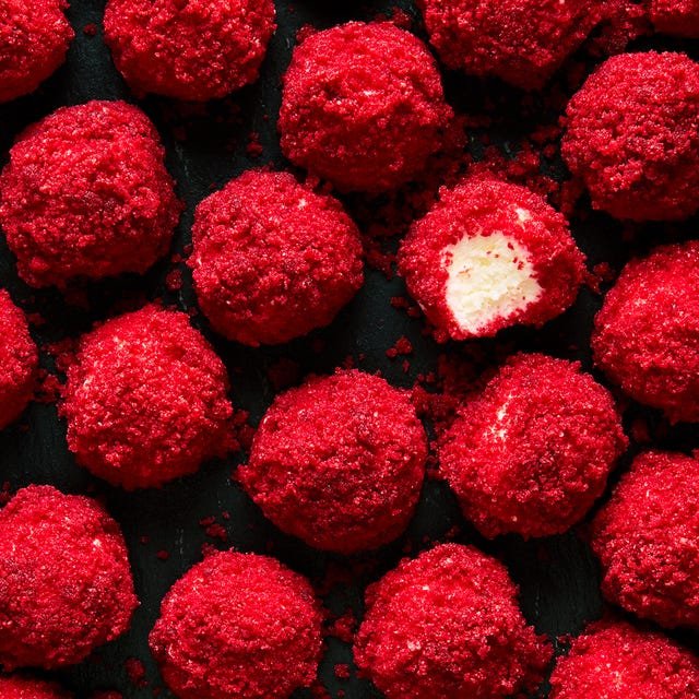 cheesecake bites rolled in red velvet cake pieces
