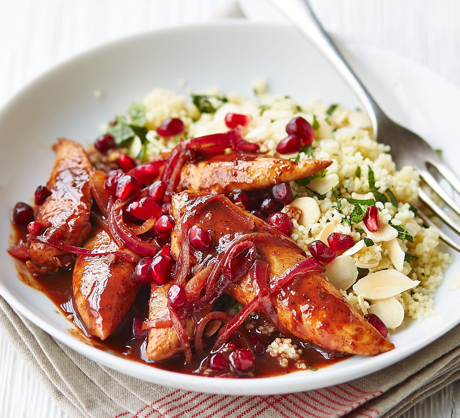 Pomegranate chicken with almond couscous