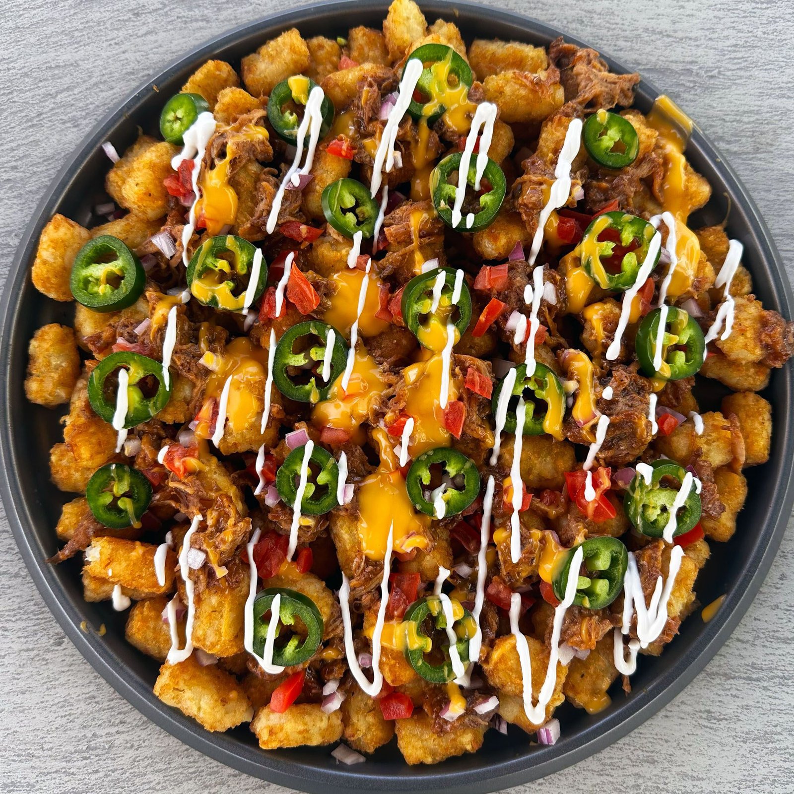 Totchos (Tater Tot Nachos) - DudeFoods.com - Food Recipes & Videos
