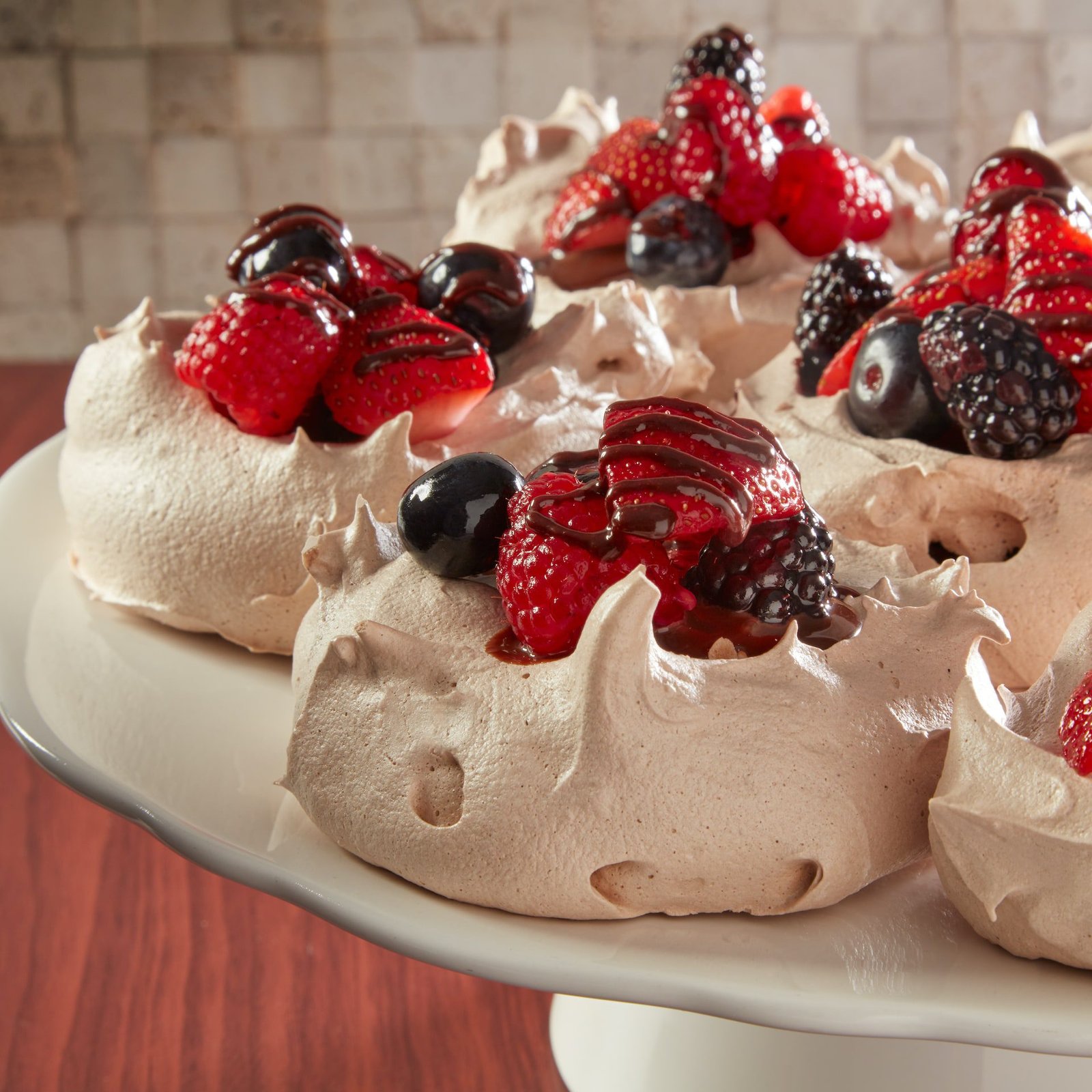 Chocolate Pavlovas with Bourbon Mixed Berries